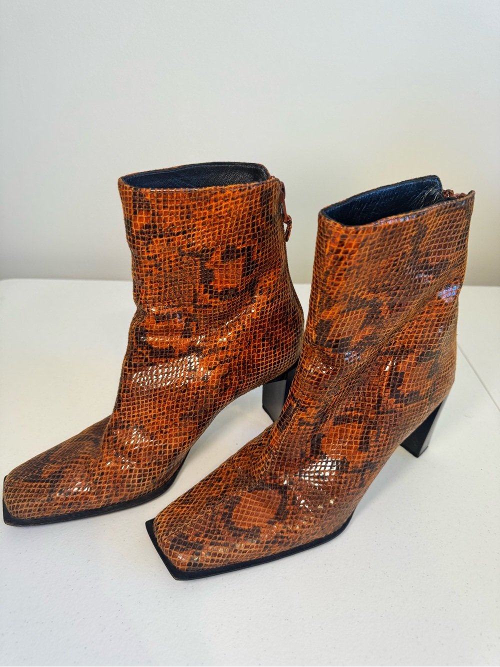 Stuart Weitzman Orange Snake-Print Ankle Boots
